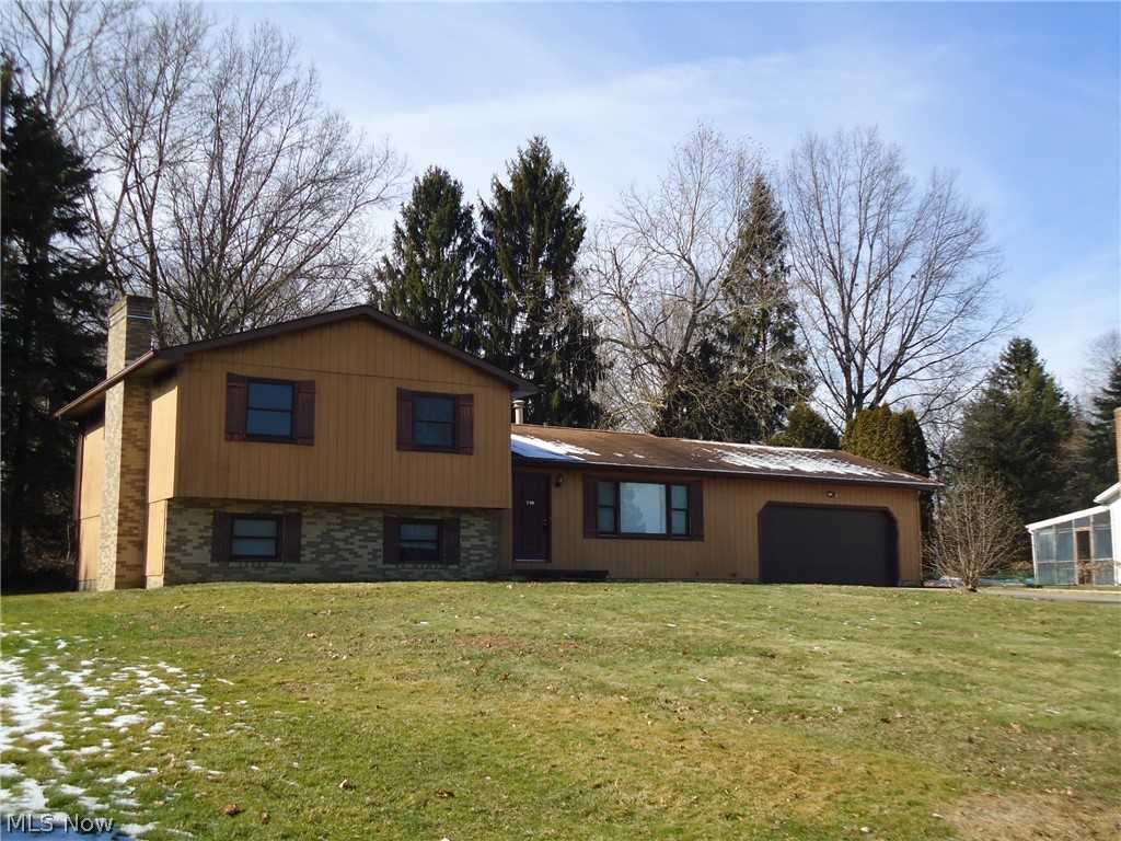 Great Tallmadge neighborhood.  Spacious 4 bedroom/ 3 full bath split level home.  Family room with built-in bookshelves and Fireplace.  Applianced Kitchen.
Dining area with sliders leading to concrete patio.  Large lot with storage shed/workshop.  2 car attached garage.  Convenient location. 
Call today for your private viewing.