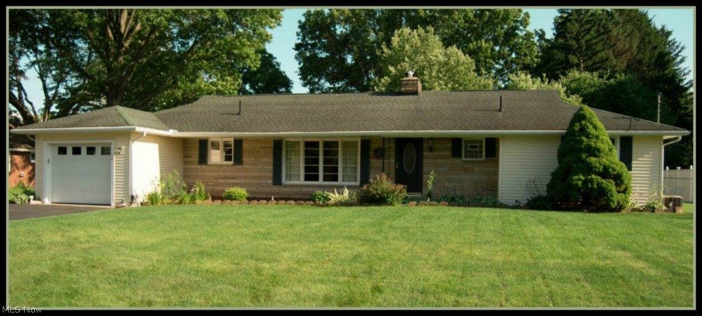 Great value! Curb appeal galore! Move-in ready. This 1528 sq ft ranch is in an established neighborhood where homes for sale are often hard to come by. This is the first time on the market in decades and ready for the next owner to create as their own. It features an oversized living room w/ a fireplace, 3 bedrooms (one w/ a built in vanity), a nice flat lot (fenced) and appliances. The furnace was replaced in the last few years. Centrally located near shopping, restaurants, the 30/21 interchange and minutes to I-77. An opportunity not to be missed in the Village of Navarre. The summer market is heating up so call for a tour today.
