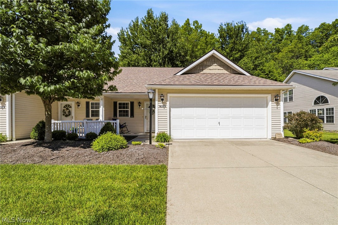 Located in the Willow Woods community of North Olmsted, this spacious 3, bedroom, 2 bath condo features brand new flooring throughout. The open floor plan offers vaulted ceilings in the living room along with a cozy fireplace. The updated eat in kitchen includes newer appliances, a pantry, and a sliding door that leads to a private patio. The third bedroom off the living room is currently used as an office but can easily be converted back to a bedroom. The primary suite is set apart from the main living area and features vaulted ceilings, a walk in closet, and a private full bath.