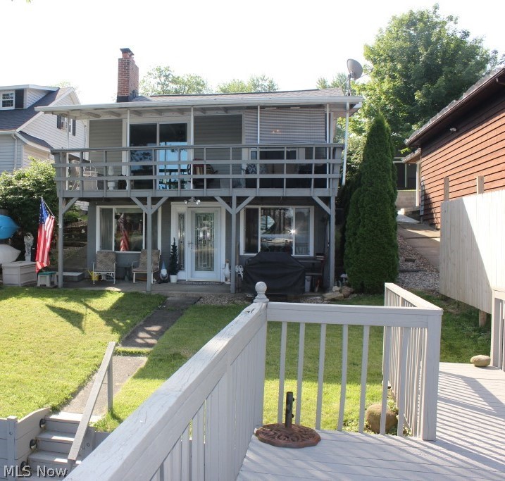 Adorable lakefront ranch with phenomenal views, 2-3 bedrooms, 2 baths, approx. 1450SF including walkout lower level, 2 car garage & a magnificent deck over the water* Starting with 3 season sun room (updated) having access to entry/kitchen area*  The remodeled kitchen having granite counter tops, pantry, stainless refrigerator, dishwasher and a  movable island* Great room with window wall including slider to balcony overlooking lake, gas log fireplace & wood floor* 2 bedrooms & 2 updated bathrooms complete the first floor* Walkout lower level includes family room with slider to covered patio overlooking lake, free standing bar, office or bedroom for guest with large window with lake view  &  partial bath -- a great entertaining area* Other updates over the past few years, but not limited too, windows & doors, shingles, siding, furnace (4 yrs.), electrical, dishwasher (2 yrs.), & garage shingles (5 yrs.)* Concrete sea wall with dock* Private well, public sewer* Great value on Portage La