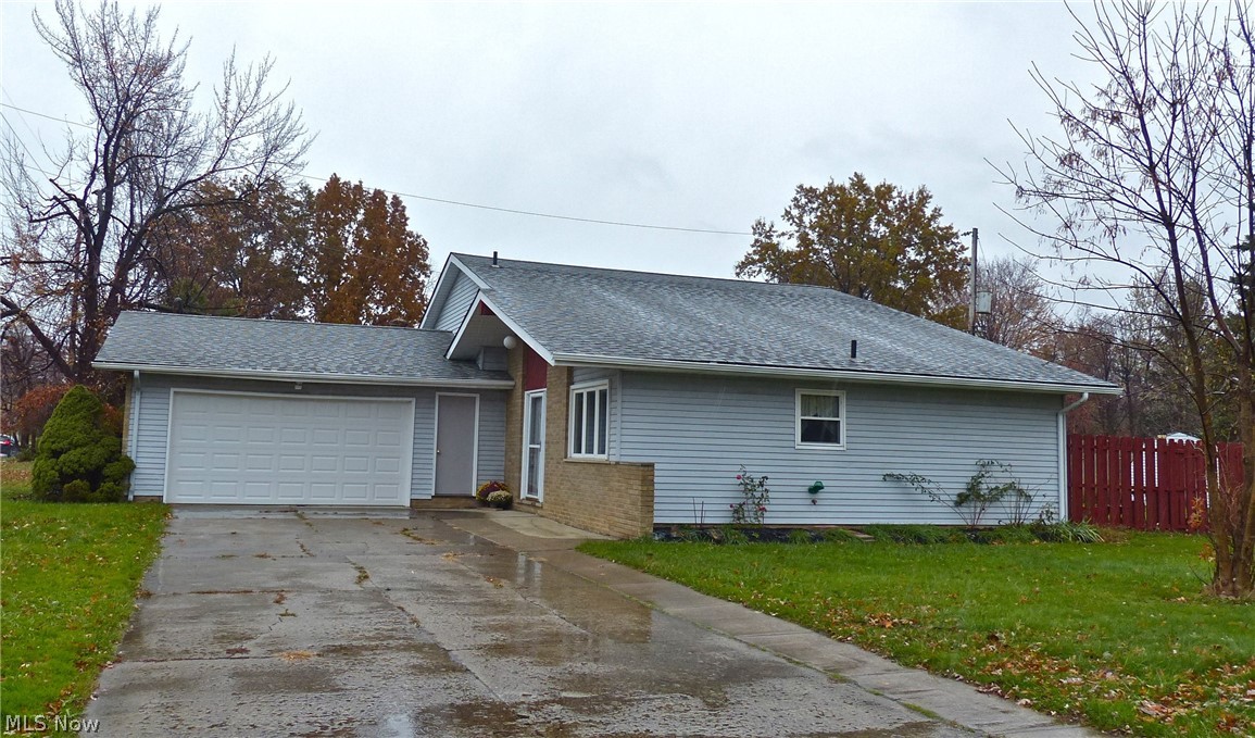 Brick and Vinyl split level located in convenient location to Rt. 2, schools and shopping. Vaulted & ceramic foyer entry, oak doors, Open style volume ceiling living room with blind enclosed patio doors, laminate in formal dining, oak eat in kitchen with stainless appliances, abundant counter space and ceramic flooring, LL family room with brick fireplace with WB heat insert, natural light and ceiling fan, 4th bedroom, Full bath, laundry room with washer, dryer and tub plus garage access to 2 car heated garage with storage above, 3 bedrooms upstairs with a full bath (granite vanity plus easy-care surround in tub, nice size patio with privacy fencing, storage shed,  Central air, attic fan, Per owner: New garage door, new windows, new sump pump, new carpeting.  Freshly painted plus newer roof.  12 month home warranty, Immediate occupancy