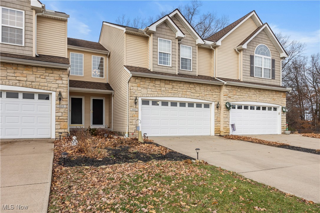 A beautiful home warms the heart! Gather around the cozy fireplace and be comfortable during this winter season. Unique and exceptional 3 bedroom, 2.5 bath townhouse style (single family home) with beautiful stone and vinyl exterior, 2 car attached garage with entry to the kitchen is a plus and very convenient. Quality Amherst schools! Enter to be amazed by this spectacular, 2 story foyer and views of a spacious open floor plan. Very light decor & large windows for an airy filled and cheery floor plan. The open floor planned kitchen includes appliances  and opens to the oversized great room that boast of a warming fireplace. Former model home that includes all of the upgrades, plus a 2nd floor laundry for convenience. the primary bedroom suite will pamper you from start to finish w/private dual sink ensuite. The full open basement with endless possibilities is a plus. Nice, spacious closets. Situated on a premium lot with trees in the back to provide scenery for all seasons so relax and enjoy easy entertaining on the nice deck. This lovely home is conveniently located with easy access to highways and shopping additionally, the Home Owners Association offers access to the club house w/pool and exercise equipment.