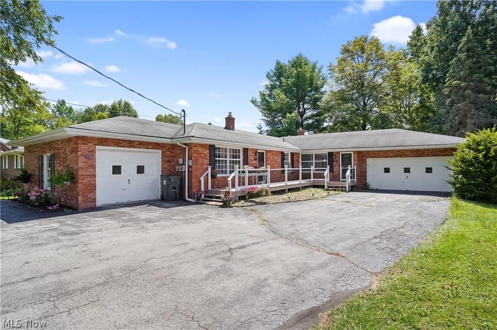 Absolutely STUNNING All-Brick Duplex in Boardman!
Step into the beautifully updated 2-bedroom unit, featuring a gorgeous modern kitchen with granite countertops, a stylish backsplash, a breakfast area, and stainless steel appliances. The spacious living room is perfect for relaxing, while the two large bedrooms offer comfort and privacy. The fully renovated bath showcases composite granite countertops, a floor-to-ceiling tub/shower with exquisite tile, and a brushed gold vanity with LED mirrors for a sleek, modern finish. Additional highlights include a 1-car attached garage and a full basement with laundry and plenty of storage. This side was completely remodeled in 2022 with all-new kitchen cabinetry, appliances, lighting, luxury vinyl flooring, fresh paint, and a washer/dryer. Current rent: $1,300/month.

The 3-bedroom unit is equally impressive—offering a spacious living room, a cozy family room, a large eat-in kitchen, and three generously sized bedrooms. The updated bath and fresh paint throughout provide a bright, modern feel. Enjoy outdoor living on the private back deck overlooking the beautiful backyard. This unit also features a 2-car attached garage, full basement with laundry, and is currently rented for $1,516/month.(month to month)

Additional updates include a new front porch (2020) and overall well-maintained exterior. Set back nicely from the road, this property offers privacy, curb appeal, and a fantastic investment opportunity—perfect for owner-occupants or investors alike.  Water included in Rent.