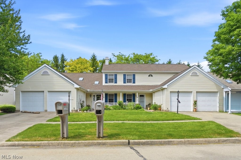 Welcome home to this stunning ranch-style condo nestled within the highly desirable Springfield Commons cluster community. Designed for effortless, one-floor living with absolutely no stairs, this home provides ultimate accessibility and maintenance-free peace of mind. From the moment you step inside, you are greeted by an expansive open-concept layout where soaring vaulted ceilings, a cozy gas fireplace, and beautiful skylights combine to flood the area with natural light, creating an exceptionally bright and warm space. Modern upgrades shine throughout the home, featuring fresh paint, beautiful new flooring, and brand-new stylish light fixtures. The beautifully updated kitchen is a chef's delight, equipped with all-new stainless steel appliances, ample prep space, and a convenient breakfast bar. Retreat to the spacious master suite, where elegant French doors open directly onto a private, stamped concrete patio?your own personal outdoor oasis. Best of all, this turnkey property boasts a very low monthly HOA fee of just $115, which takes care of landscaping and snow removal. Perfectly situated for maximum convenience, you will enjoy quick, easy access to major highways, local parks, and premier shopping centers.