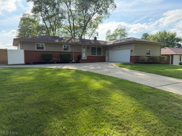 Beautiful Champion brick & vinyl ranch situated on a fantastic corner lot with mature trees providing wonderful shade. This bright and airy home offers 3 bedrooms, including a master bedroom with full bath and 2 1/2 baths total. The large living room features a vaulted ceiling and wall-mounted TV, while the dining room offers a built-in hutch & vaulted ceiling. The perfect kitchen includes stainless steel appliances and breakfast bar seating. The family room is cozy with an electric fireplace. The unique laundry room includes new washer and dryer in 2025, built-in shelving and convenient access to the full basement, a large storage room and the attached garage. Enjoy the bright sunroom with portable air conditioner & new sliding glass door with built-in blinds leading to a stained patio, an extremely private backyard with wood & vinyl fencing plus a small turf area. Additional features include a 2-car attached garage with built-ins and circular cement driveway. New HVAC system in 7/2025. Updates in 2023 include, stained concrete patio, rear fencing with gate, front door, storm door, sliding glass door, electric fireplace insert, vanity cabinet & toilet on lower level, extra lower-level lighting, electrical panel & garbage disposal. Updates in 2022 include new blinds throughout and all kitchen appliances. All you need to do is move in!