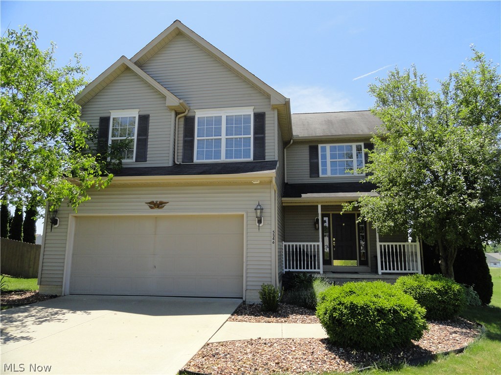 Hunters Run Charming Colonial in excellent condition.  Foyer entry steps into 2 story light & bright 23 x 16 Great room with vaulted ceilings, gas fireplace and open staircase to the second floor.  The spacious formal dining has hardwood floors, the eat-in kitchen has beautiful walnut stained cabinets, tile backsplash & sliders that step out to the circular stone patio overlooking the big back yard.  First floor laundry and a 1/2 bath complete the first floor.  The master suite offers a private bathroom with double sinks, garden tub, walk-in closet and a separate shower.  Lower level rec room plus office or 4th bedroom.  Call today to make this lovely home your own.