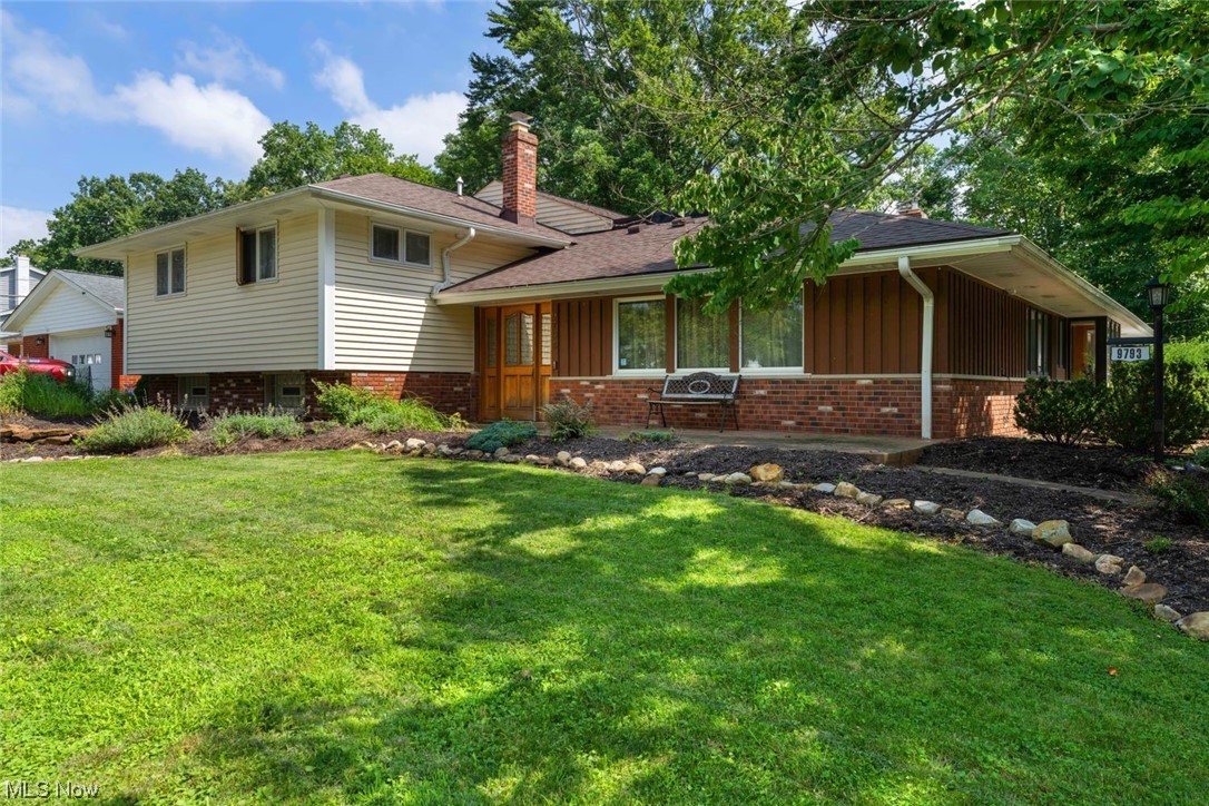 This one of a kind home features an in-ground pool, gym, indoor hot tub room AND many more surprises. The heart of he home is the stunning great room with its vaulted ceilings, custom woodwork views of your outdoor oasis. The heated, salt water pool can be used year round & contains far less chlorine making it safer for you and your skin! There is plenty of entertaining space with 2 living and dining areas nestled around the mid century modern kitchen, featuring a subzero fridge and in home water filtration system. The lower level offers a finished area, perfect for a play area, office or guest suite. You will live worry free thanks to a new roof (21'), new hwt (23'), new pool heater and pump (22') and Astroturf greenery for an always perfect yard. No expense was spared or detail forgotten when this home was built. Even the garage floor is beautifully stamped concrete. Its your time to own the nicest home in the neighborhood.