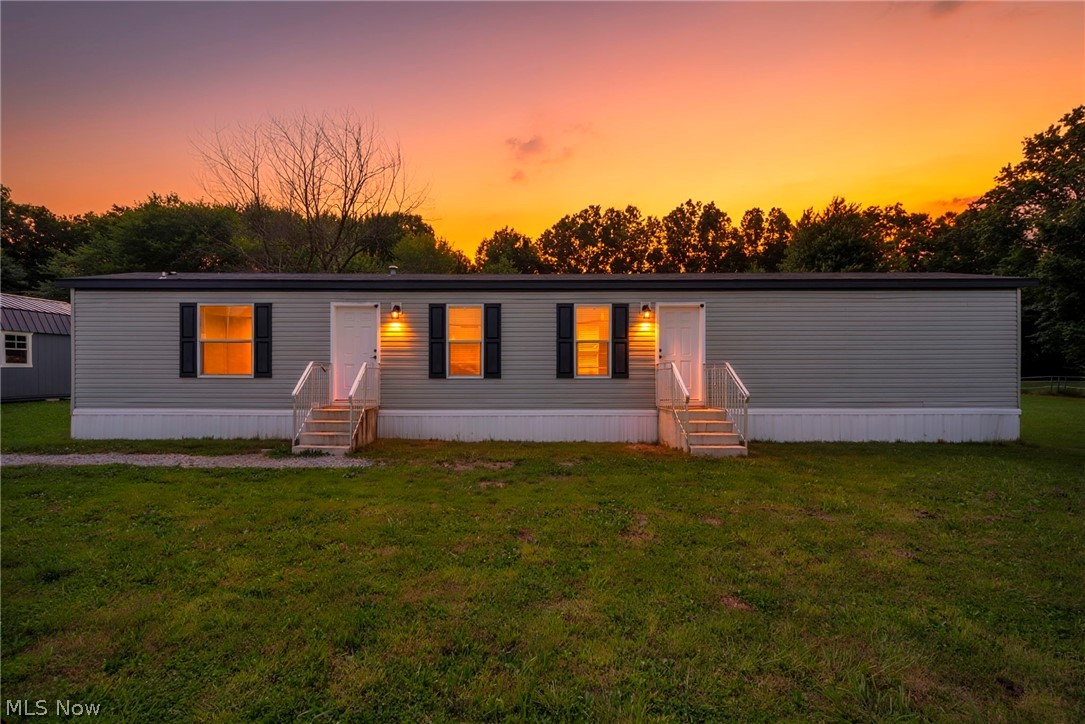 Situated on 8.92 acres in Goshen Township, this versatile property offers a rare combination of open ground, mature trees, and modern improvements. The 2022 manufactured home features 3 bedrooms, 2 full bathrooms, all new appliances, and a new whole-home water filtration system, making it ready for immediate occupancy.

The acreage provides a variety of possibilities, with open space suitable for gardening, recreation, or other outdoor activities, while the wooded portion creates a scenic backdrop and added privacy. Previously used for horses, the property includes a fenced area along with two storage sheds that convey with the sale, offering ample space for equipment, tools, or hobbies.

A private well and existing septic system are already in place, adding to the property's functionality. Whether you're looking for extra elbow room, a place to enjoy the outdoors, or acreage with room for future plans, this property delivers a unique opportunity to own nearly 9 acres in a desirable Goshen Township location.

Enjoy the flexibility of country living while remaining within a convenient driving distance of shopping, dining, and major routes. Schedule your private tour and experience everything this property has to offer.