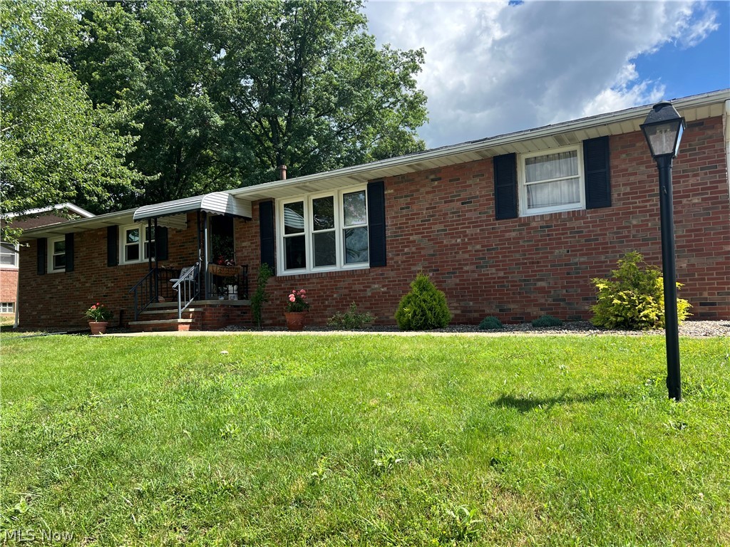 Brick ranch on dead end street with very nice surrounding homes. 3 bedrooms, eat in kitchen and attached garage. Full basement with finished areas. Very private fenced in back yard. This property is located close to schools and downtown. Call today for a personal showing!