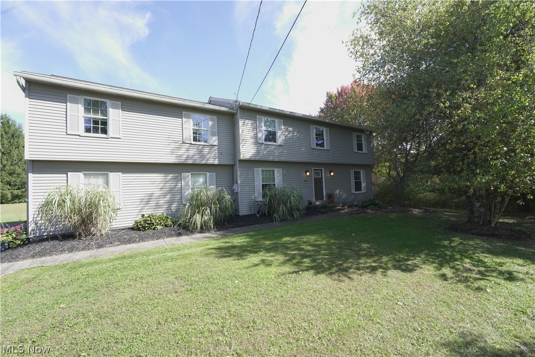 Welcome to this beautiful colonial located in Hudson. Featuring 4 bedrooms and 2.5 baths, this home is completely move-in ready! The family room features well maintained tile floors and a beautiful fireplace with a view to the back deck. The kitchen has granite countertops, a breakfast bar, pantry, and conveniently located near the half bath. Upstairs you will find the massive master bedroom (22 x 20) with a walk in closet and master bath. The other 2 large bedrooms are carpeted and have great sized closet space, while the final bedroom is tile floored and could be used as a beautiful office space. Full basement is ready for you to add your own character. This home sits on 1.12 acres, do not miss your chance to see this!
