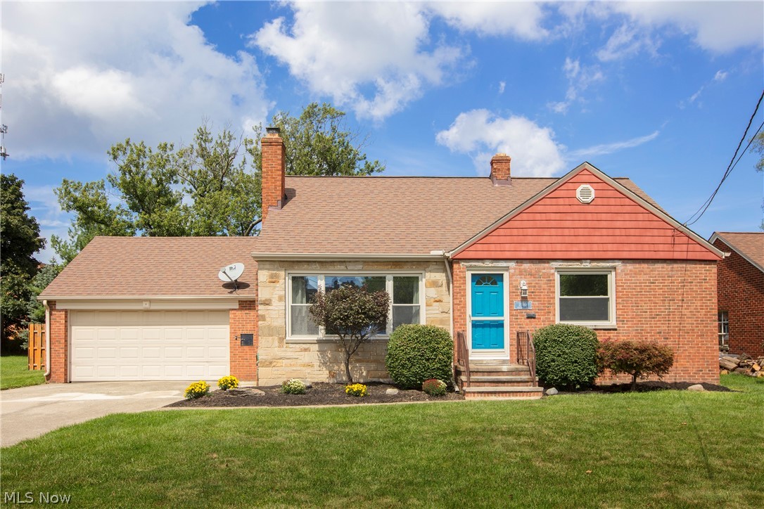 Welcome home to this charming brick Cape Cod in the heart of Fairview Park. The living room has a gorgeous fireplace, huge windows and classic fireplace. Dining area features hardwood floors, kitchen has neutral colors and vinyl plank flooring. Large primary bedroom is on second floor. Updated bathrooms, modern paint colors. Attached 2 car garage. Basement is perfect for entertaining, featuring wood flooring, another fireplace, custom bar with concrete counters, mini refrigerator and sink. America's Preferred Home Warranty provided.