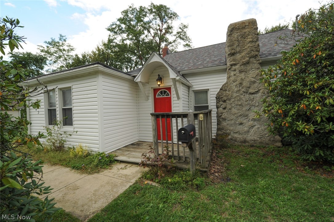 Welcome to this beautiful cottage home!  This sweet cape is tucked back from Briner Ave in the center of a half acre + lot.  The incredibly large tree lined back yard is already fenced in and has an underground electric fence as well.  Beyond the fenced area is MORE green space and a separately fenced in spot for a garden & compost.  Enjoy your evenings outdoors around the brick and stone fire pit.  There are also 2 large sheds for tons of storage.  Front door opens into a nice separate entry with room for coats, shoes and more.  Living room, 1 first floor bedroom and upper level have newer carpet with pet pad.  Larger 1st floor bedroom also has a gorgeous armoire that stays.  Original hardwood floors in hall and 2nd bedroom (also under 1st floor carpets).  Living, dining and main floor bedrooms all have ceiling fans.  Stunning bathroom with granite top vanity, vessel sink and sharp wood look flooring all within 1 year.  Updated kitchen with all the appliances, top of the line exhaust