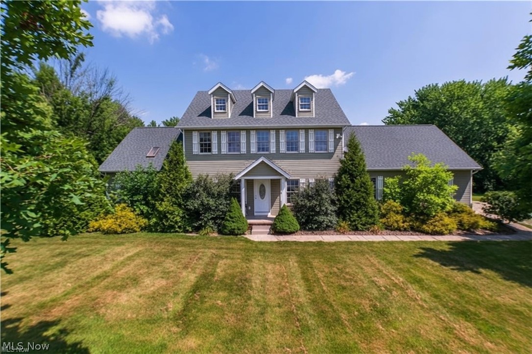 Welcome to your own private retreat in Hartville, Ohio! Nestled on 5 scenic acres, this beautiful 5-bedroom home offers the perfect blend of space, comfort, and peaceful living while remaining just minutes from shopping, dining, and local amenities.
This home is designed with both everyday living and outdoor enjoyment in mind. The home features a desirable first-floor master bedroom, providing convenience and privacy. The floor plan offers generous living areas for family and entertaining  friends. The finished basement adds valuable living space, perfect for a recreation room, home theater, fitness area, or additional storage space. Step outside onto the expansive back deck and take in the picturesque views of your 5-acre property. Whether you're enjoying your morning coffee, hosting summer cookouts, or simply relaxing in the peaceful surroundings, this outdoor space is sure to become a favorite. With five spacious bedrooms, a finished basement, a first-floor master suite, and plenty of room to roam, this exceptional Hartville property offers the perfect combination of privacy, comfort, and convenience. Don't miss the opportunity to make this beautiful home your own! Enjoy the tranquility of rural living while being just minutes from Hartville's charming shops, restaurants, parks, and the renowned Hartville Marketplace & Flea Market.