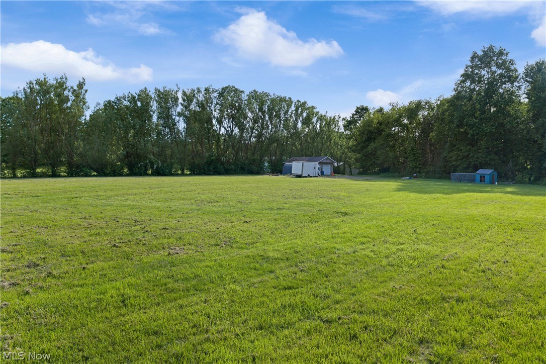 Discover the perfect opportunity to build your dream home on this beautiful 3.23 acre parcel in Chippewa Township! This cleared, flat and buildable lot offers a peaceful rural setting while still providing convenient access to nearby amenities. The property features a spacious 24' x 30' garage with electric already in place, making it ideal for storage, hobbies or workshop. A gravel driveway is established, and electricity is available at the property. Enjoy the open space and endless possibilities this versatile acreage provides. Whether you're ready to build now or invest for the future, this property offers a rare combination of usable land, existing improvements and a great location within the Chippewa Local School District.