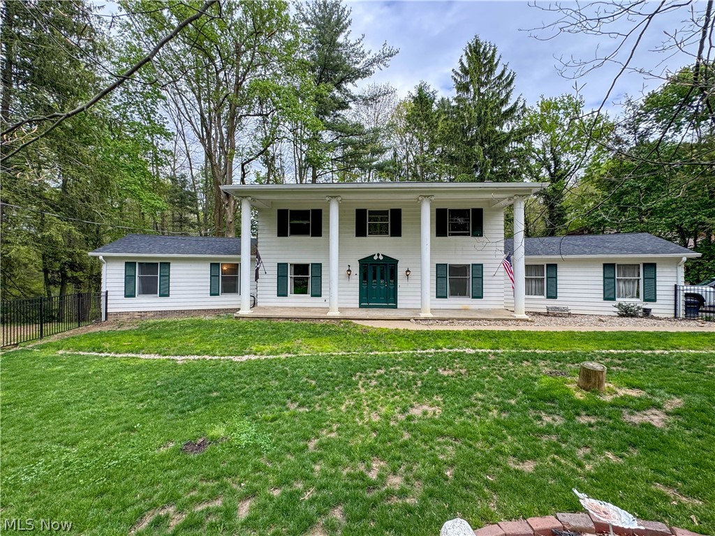 Welcome to 1318 Highland Ave E, a spacious and character-filled home offering Over 3,000 square feet of living space in the Salem/Columbiana County area. This well-sized property features 4 bedrooms, 2.5 bathrooms, first-floor laundry, generous living areas, and a functional layout with plenty of room for everyday living, entertaining, guests, or working from home. Inside, you’ll find an office with hardwood parquet floors, a warm and inviting den highlighted by a beautiful fireplace with a large mantle and custom doweled hardwood floors, plus a formal dining room featuring a second fireplace that adds even more charm and character. The owner’s suite offers excellent comfort and convenience with a walk-in closet and private ensuite bath. The home’s unique architectural details continue with a curved staircase and an upstairs room with a distinctive curved wall, creating a one-of-a-kind feel that sets this property apart. The basement offers excellent storage along with multiple finished living areas, including a large second living space complete with a third custom stone fireplace and wood mantle. Off the main level, an elevated deck overlooks a wooded backyard that provides unmatched privacy, even during the off-season. The fenced front yard includes a French drain system designed to help keep the yard dry and enjoyable. With spacious rooms, three fireplaces, unique craftsmanship, flexible living areas, and a private wooded setting, this home offers a rare combination of size, charm, and character in a convenient location.