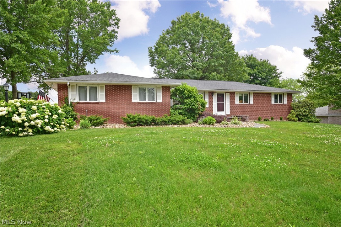 Wonderful country living is what you'll find here at 1732 Deerwood Cir.  Set on a double lot giving you over an acre to stretch out on you'll find this brick ranch to have everything you'll need.  This home features a two car garage, 3 bedrooms, 2 baths, eat-in kitchen, formal dining, living room, family room, rec room and a sun room.  Updates to the home include a newer heat pump and central air 2017, waterproofed basement 2011, and a new roof in 2010.
