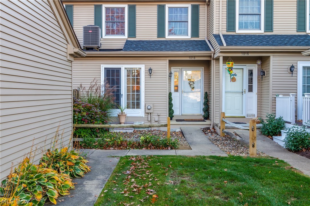 Move right in and enjoy all the space in this lovely townhome!  Immediately feel welcomed home as soon as you enter!  The lovely kitchen with island, laminate flooring and plenty of cabinets has a great feel and very functional.  The dining room provides a nice gathering area with an open concept lofted with a view of the living room.  A convenient half bath is located on the main floor. The living room with fireplace and vaulted ceiling is located on the first level with access to the private patio! All appliances stay including washer and dryer!  Make your way upstairs and you will find two nicely sized bedrooms and plenty of closet space!  There is an additional finished room is the basement with a closet that can be used as an additional bedroom if needed.  Hurry and take a look before this one slips away!