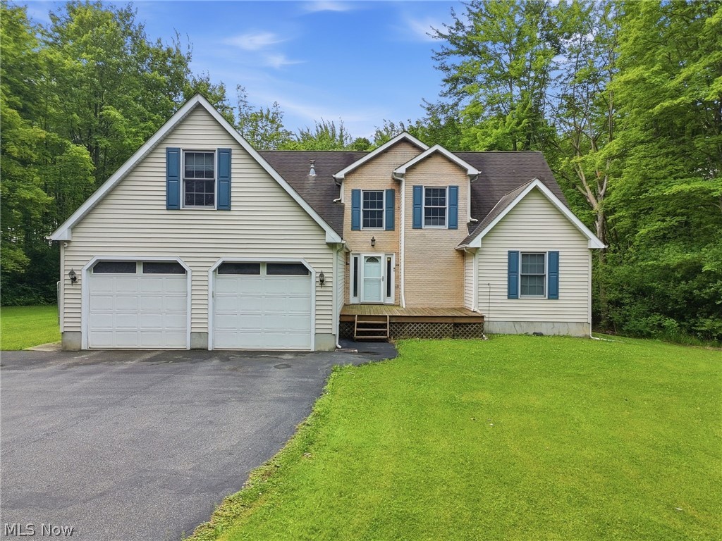 Welcome to 1808 Mini Ranch Trail in Geneva’s desirable Harpersfield Township! Nestled on 6.09 picturesque acres, this impressive 4-bedroom, 2.5-bath home offers over 2,800 square feet of living space, combining privacy, functionality, and room to grow.

Step inside to discover a spacious floor plan featuring a large pantry, abundant storage throughout, and a convenient half bath just off the front entrance. The main living areas are designed for comfort, while the oversized bonus room provides endless possibilities for a game room, home office, media room, or additional living space. The finished walkout basement adds even more versatility, and the custom bar will remain with the home for your enjoyment.

The owner’s suite is a true retreat, complete with enormous walk-in closets, a double vanity, walk-in shower, and plumbing already in place should you wish to add a soaking tub. Three additional bedrooms are located upstairs, providing ample space for family and guests.

Outside, enjoy the peaceful setting from the back deck with ramp access overlooking the property’s beautiful acreage. Bow hunting is permitted, making this a rare opportunity for outdoor enthusiasts. Additional highlights include a 2-car attached garage, storage shed, well and septic utilities, all appliances included, a newly paved driveway, furnace and central air updated just two years ago, hot water tank replaced two years ago, and a home warranty for added peace of mind.

If you’ve been searching for acreage, space, and modern updates in a desirable Geneva location, this property is one you won’t want to miss!