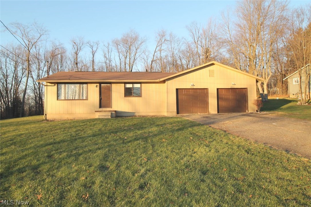 Fantastic Investment Opportunity or a perfect home for a large or conjoining family.  Great Ranch duplex located in Lake Twp on almost an acre lot. Each unit has two large bedrooms, a large eat in kitchen with plenty of cabinets and counter space; and the living room area is open from the kitchen.  There is also a full basement on each side 1 is partially finished for your enjoyment.   Roof is 7 years young, and the entire home has had insulation blown in, and a newer hot water tank installed. The well system is only 2 years old and Unit #1 has newer carpeting less than a year old. There are also washer/dryer hookups for your convenience.  You will also find a 10x16 storage barn for extra storage if needed.  Exterior of the home was painted about 7-8 years ago. Large backyard has a ton of room for all your activities, along with a firepit. Unit 2 has a month to month tenant at $700/mo.