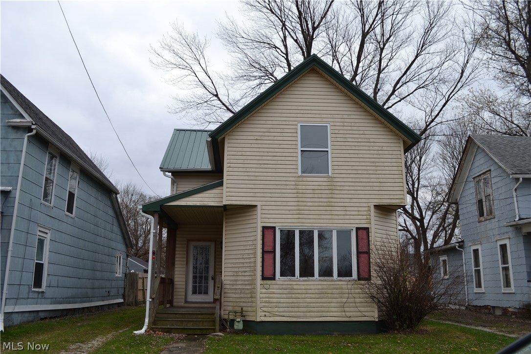 This is a fantastic opportunity to own a home in Conneaut! This colonial style features a nice sized yard, a 1 car detached garage, and a huge back deck! Inside you'll find extra high ceilings on the first floor, and a front living room with a lot of natural light. The first floor office/study already has a closet and built-in shelving and could easily be converted to a 3rd bedroom! There's a large storage room on the first floor that could be converted to a great walk-in pantry just off the kitchen. The second floor features a bathroom with pedestal sink and 2 large bedrooms. The floors are unfinished upstairs - leaving the potential for you to add your own touches! There's also a full unfinished basement for extra storage space.
