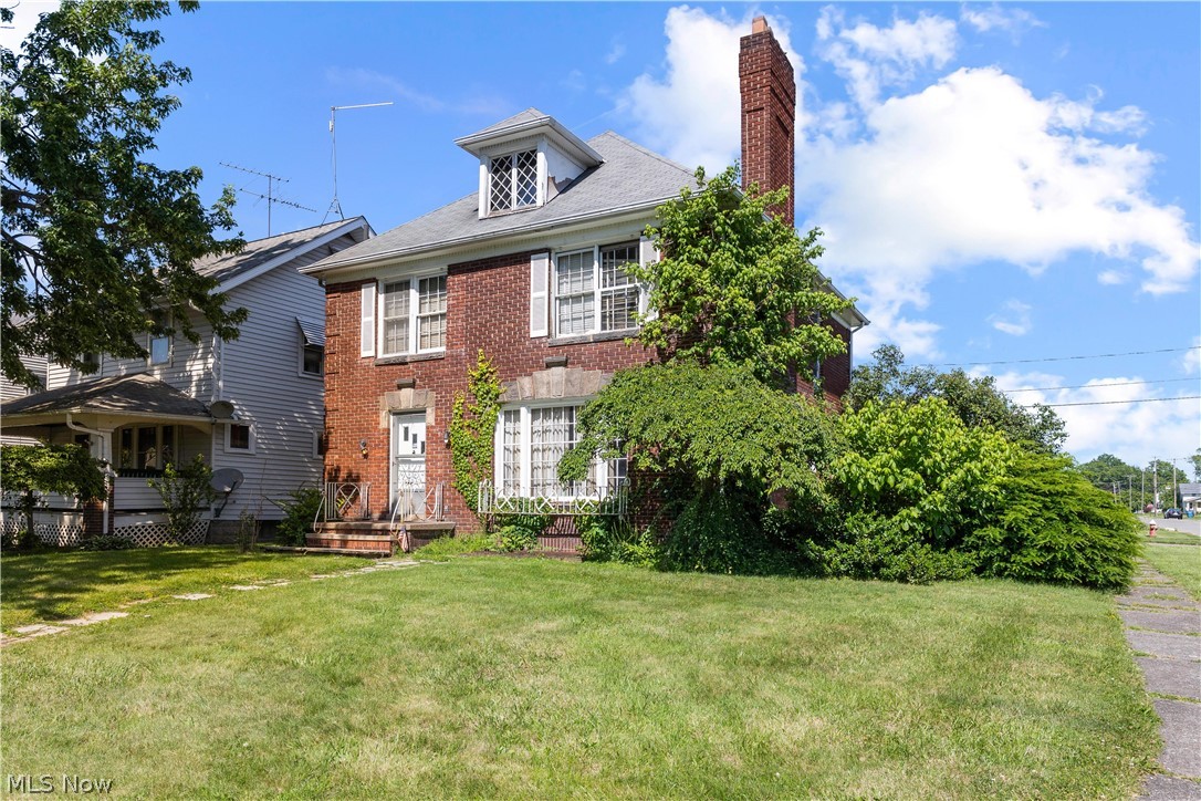 Unlimited potential for your renovation! A TRUE DIAMOND IN THE ROUGH. Loaded with character and charm throughout! ALL BRICK colonial with a brick 2 car garage nestled in the Lakeview Park neighborhood. HALF BATH on the main level! Full bath up with original vintage tile and charm from days gone by! Huge rooms! Crown molding, archways, built-ins, unique staircase, fireplace!  Rounded window in the breakfast nook would also be an adorable mini sunroom for your plants. Basement was finished with larger windows and knotty pine paneling. Kitchen has been removed and ready for you to design and replace with your preferences.  BEING SOLD AS-IS, SELLER WILL MAKE NO REPAIRS. CASH OR RENOVATION LOAN FINANCING ONLY.