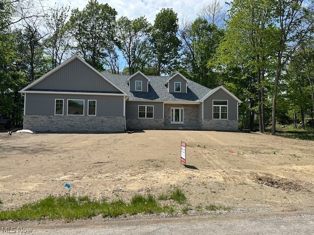 New construction 2450 square foot ranch home on a 1 acre lot on a cul-de-sac. This 3 bedroom, 2 and a half bath home features a spacious open floor plan with vaulted ceilings in the kitchen and great room and has an office to work from home. The kitchen has a large island and quartz countertops and backsplash open to the large dining area with lots of windows. The great room is open to the kitchen and has a linear fireplace with floor to ceiling stone. Large primary bedroom with generous size walk in closet and ensuite bathroom with tile shower, double sinks and private water closet. Full basement with high ceilings and oversized 2 car garage. This home has many upgrades including quartz and quartzite counter tops in kitchen, bathrooms and laundry room, luxury vinyl flooring throughout. Close to charming wineries, restaurants, Lake Erie and schools. Set up your showing to tour this home. Construction to be complete May 2026.