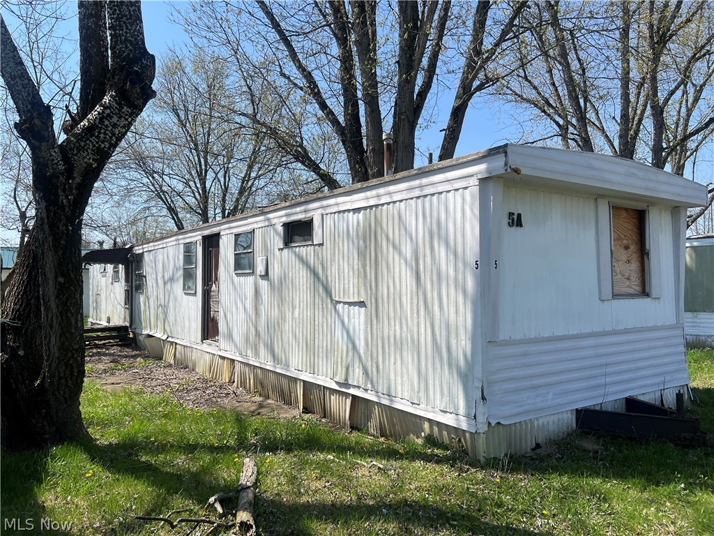 Owner financing and lease-to-own terms may be available for qualified buyers. Buyer agents welcome.   Previously a multi-unit trailer park.  Water and Electric onsite.  Block 30x17 building.  The trailers need to be removed.  Agent must accompany buyer at all times.