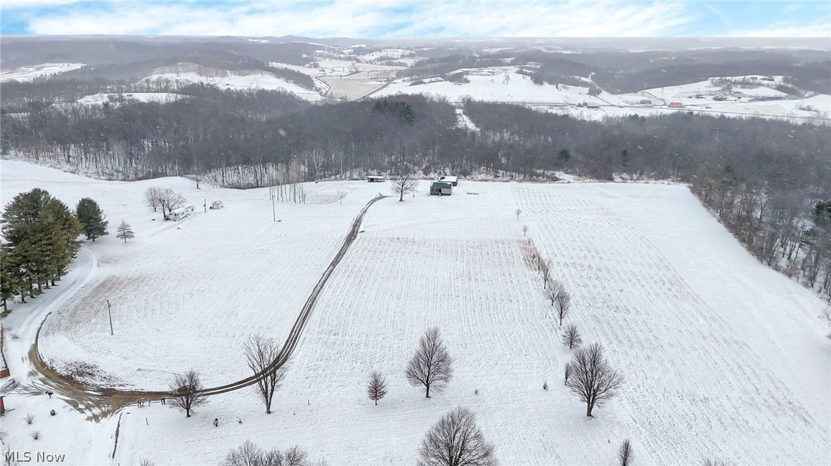 Looking for three acres in a wonderful location? This may be the perfect lot for you. Build your own home, create a private little getaway, and enjoy the peaceful setting just minutes from Salt Fork State Park. This property also includes owner access to a pond for fishing, giving you the best of country living with nearby outdoor amenities.