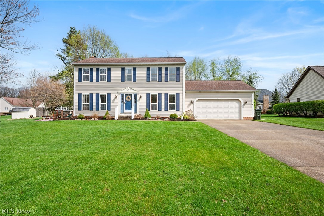 Beautifully well maintained 4-bedroom, 2.5-bath home in Macedonia offering flexible living and great entertaining space. Features include a formal living room and cozy family room with a fireplace and built-in shelving, separated by classic French door-style glass pocket doors. The spacious kitchen offers granite countertops, subway tile backsplash, farmhouse sink, and eat-in area, with a formal dining room nearby.

Upstairs, the primary suite includes a walk-in closet and a private full bath, along with three additional bedrooms. The finished lower level provides additional space for a rec room, playroom, or home office, plus laundry and storage.

Enjoy the backyard with a multi-level deck and a newly added stamped-concrete patio, perfect for relaxing or entertaining. Conveniently located near shopping, dining, and highway access.