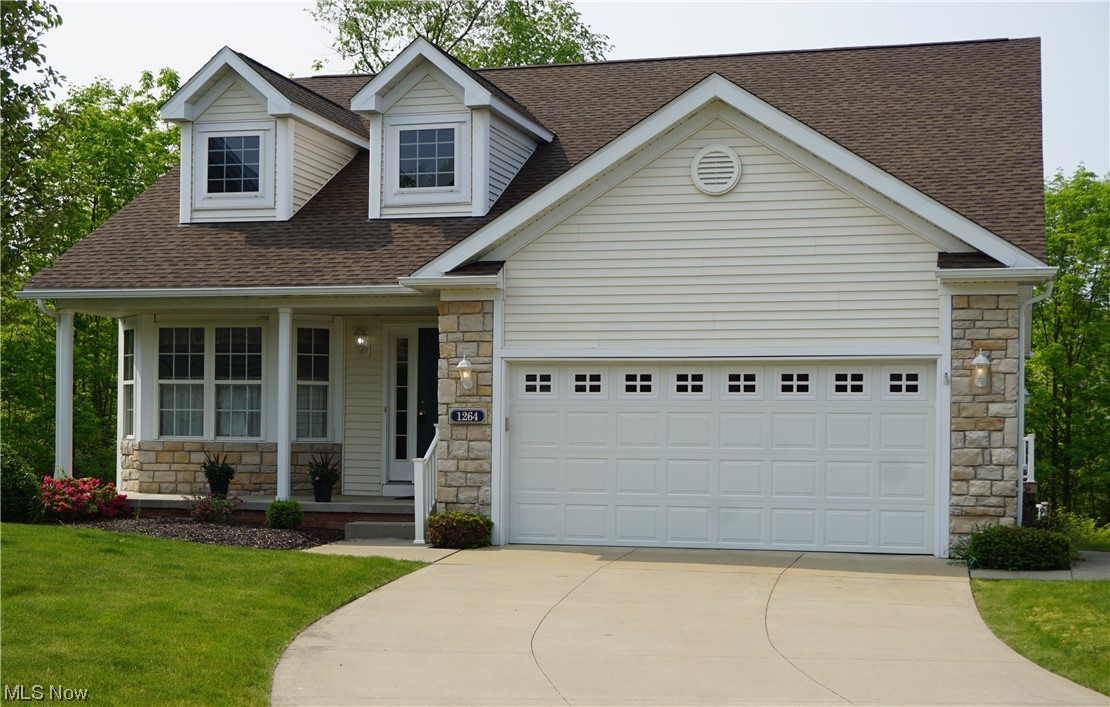 Gorgeous and spacious ranch home featuring a complete lower level suite! Tiled foyer leading to vaulted eat-in kitchen and great room.  Great room features gas-log fireplace and open vaulted ceiling and dining area. Beautiful 4 season sun room leading to composite deck. Additional office/den connected to great room. First floor master bedroom with master bath and second main floor bedroom and bathroom. Tiled first floor laundry room with washer, dryer, sink and cabinets. Lower basement level features approximately 1500 square feet of finished living space which includes a large family room with walk-out door to covered patio, 3rd bedroom attached to full bathroom, walk-in closet, and a complete second kitchen with appliances!  Basement also includes second laundry area with washer, dryer, sink and storage. Also a 14'x12'bonus room with closet on the lower level providing additional useful living space.  Beautiful private wooded backyard view from deck and patio.
