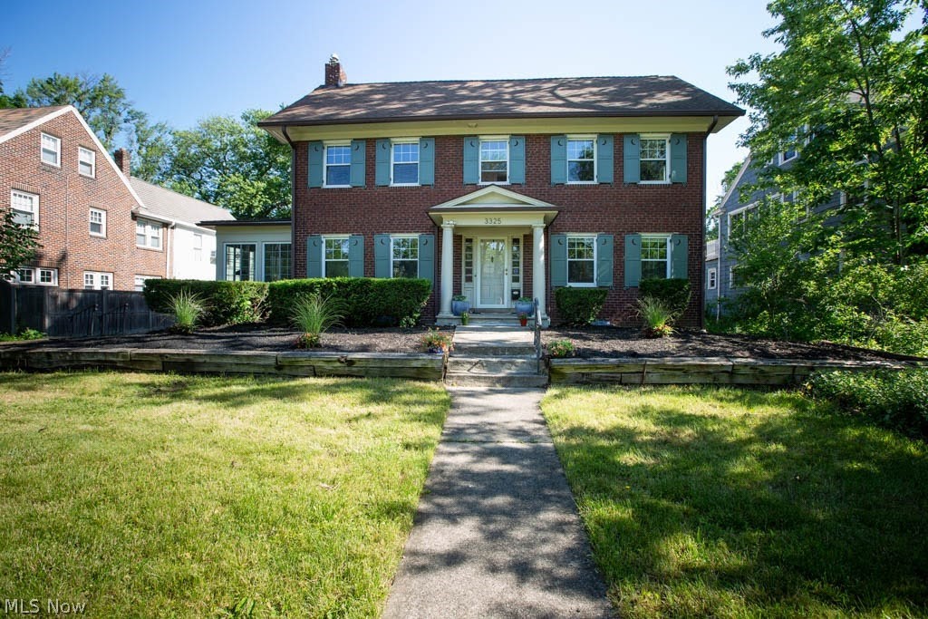 Welcome to this thoughtfully updated classic brick colonial w/ beautiful architectural details in the heart of Cleveland Hts. You will love all the original moldings, high baseboards, hand crafted crown moldings & unique curved walls throughout. No expenses were spared w/ the newer windows, updated forced air HVAC system, w/ central A/C & refinished natural hardwood floors. Improve upon your culinary skills in your updated kitchen, complete w/ recessed lighting, granite countertops & SS appliances. Kitchen is open to the dining room, w/ pendant lighting. Do not look past the beautiful custom bannister from 1st to 2nd floor. The updated 1st floor powder room, 4 season sunroom & wood burning fireplace complete the 1st floor. You will find 3 nice sized bedrooms on the 2nd floor w/ an updated shared bath, w/ ceramic tiled floor & an owner's suite w/ en-suite bathroom w/ double vanity & walk-in closet. Enter the private finished 3rd floor w/ a bedroom, an additional living space & 3rd full