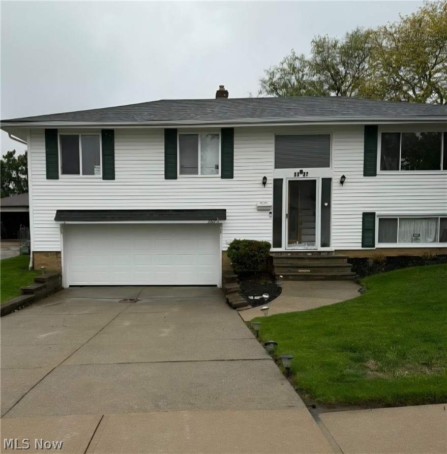 Updated Bi Level with many upgrades ! Large fenced yard * Recently refinished Hardwood floors * New Pella windows (2012) * All appliances remain * Gorgeous front door * Ceramic foyer * Spacious updated Kitchen with lovely granite counter tops, sink with cutting board, granite table to match counter tops, newer dishwasher, newer double wide fridge., & a professional five burner dual fuel convection stove * Living Room has a large window for plenty of light, a gas FP with remote and wall of fossil stone to show off the fireplace * Dining Room has a slider to lead you to a 20 x 20 deck and a large fenced in backyard with a storage shed * Amazing updated Main Bath with 4 types of stone (flooring and wall), a jacuzzi tub, lighted shelving and a unique sink and fixture * Nice sized Bedrooms with hardwood floors * New roof (2017) * Newer furnace & HWT (2015) * Extra insulation in this home * Updated electrical * Spacious Family Room on the lower level with a Laundry area and another Full Bath * Lots of cabinets in the garage * Don't let this one pass you by !
