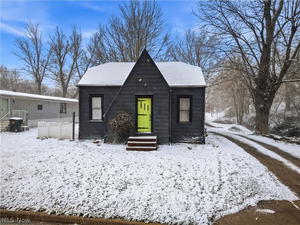 Investor Special in Homeworth! This move-in-ready property is perfect for generating rental income from day one or adding value with your own finishing touches. Featuring 2–3 bedrooms and 1 full bath, this home offers a spacious living and dining area, a generously sized kitchen, and the convenience of a first-floor bedroom and bathroom. Upstairs, you’ll find a charming Cape Cod-style space with flexible potential. Enjoy the peaceful setting with a nice backyard, a storage shed, and a wooded lot next door complete with a scenic creek—adding both privacy and appeal. Major mechanical updates have already been taken care of within the last 10 years, including the roof, furnace, hot water tank, and pressure tank—giving you peace of mind and reducing upfront costs. Whether you're looking to flip, rent for strong returns, or move in yourself, this property checks all the boxes. Schedule your showing today and make your next smart real estate move now! :) *House is being sold AS-IS Only*