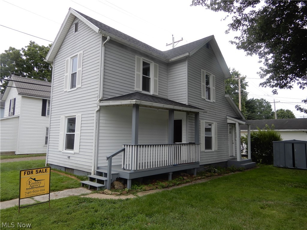 Move in ready. Newly remodeled bathroom. New windows. New roof in 2025.  Extra room on 1st floor could be used as a 3rd bedroom