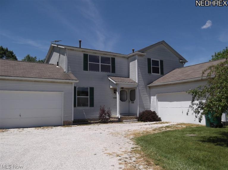 Each unit has 2 bedrooms, 1.5 baths, full basement, 2 car attached garage.  Comes with refrigerators and stoves.  Separate utilities.  Subject to new survey and new tax rate as this property currently is on 1 -2.44 acre parcel with another duplex.  Both duplexes may be purchased together as a package.  Other duplex is 11395-97 Market Ave N.  Located near schools and shopping, but has a nice country atmosphere.