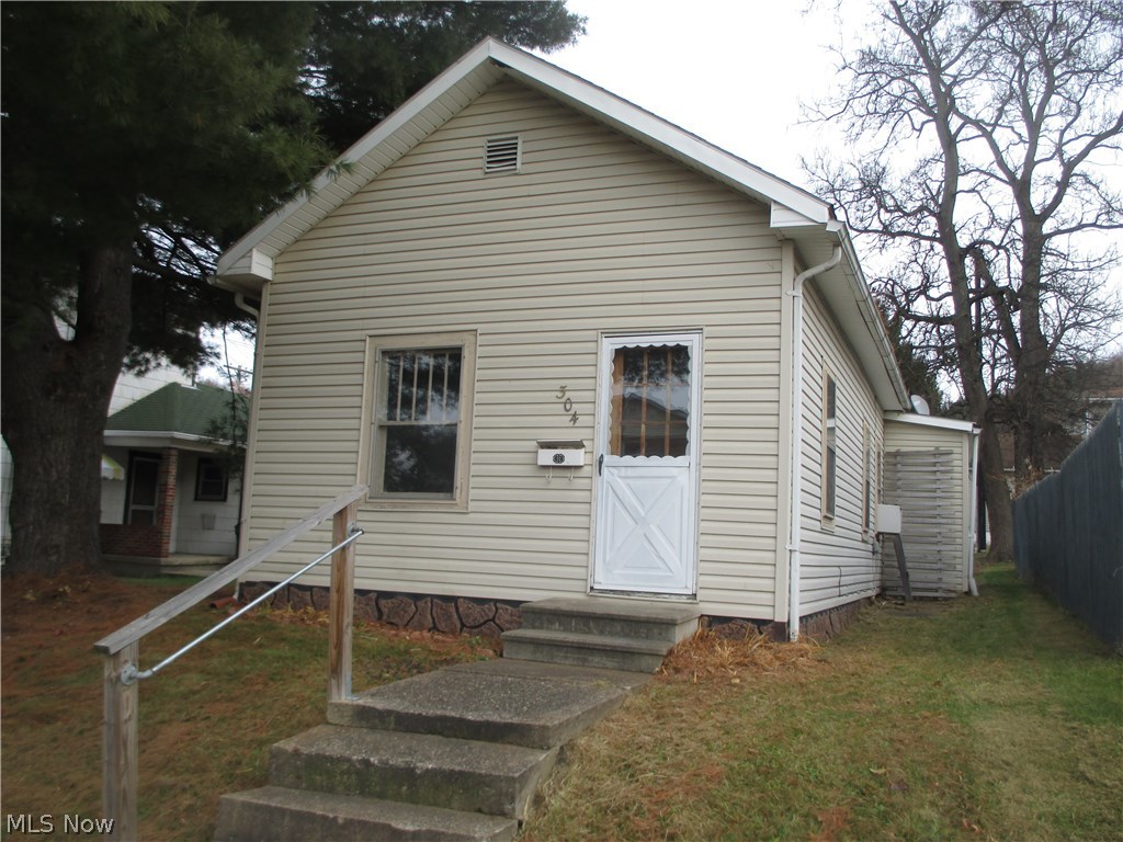 Updated flooring and clean walls. Window air conditioner. Dining room could be used as a family room. Fenced back yard. Parking off the street in the back. Affordable. Why pay rent? Rooms are estimated for size.
