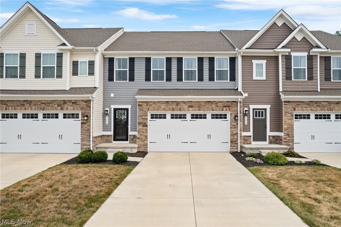Beautifully maintained and move-in ready, this spacious and stylish Stow townhouse offers 3 bedrooms, 3 full
and 1 half baths. The open-concept main level features a large kitchen, inviting living area, and convenient half bath. A
fully finished walk-out basement includes a wet bar, additional flex room with egress window, full bath and access to a
private patio overlooking a peaceful pond. Enjoy outdoor living from the upper deck or lower patio , surrounded by the
serene backyard setting. Loaded with premium Ryan Homes upgrades and located in Stow’s highly desirable school
district, this home combines comfort, style, and easy entertaining in one exceptional package