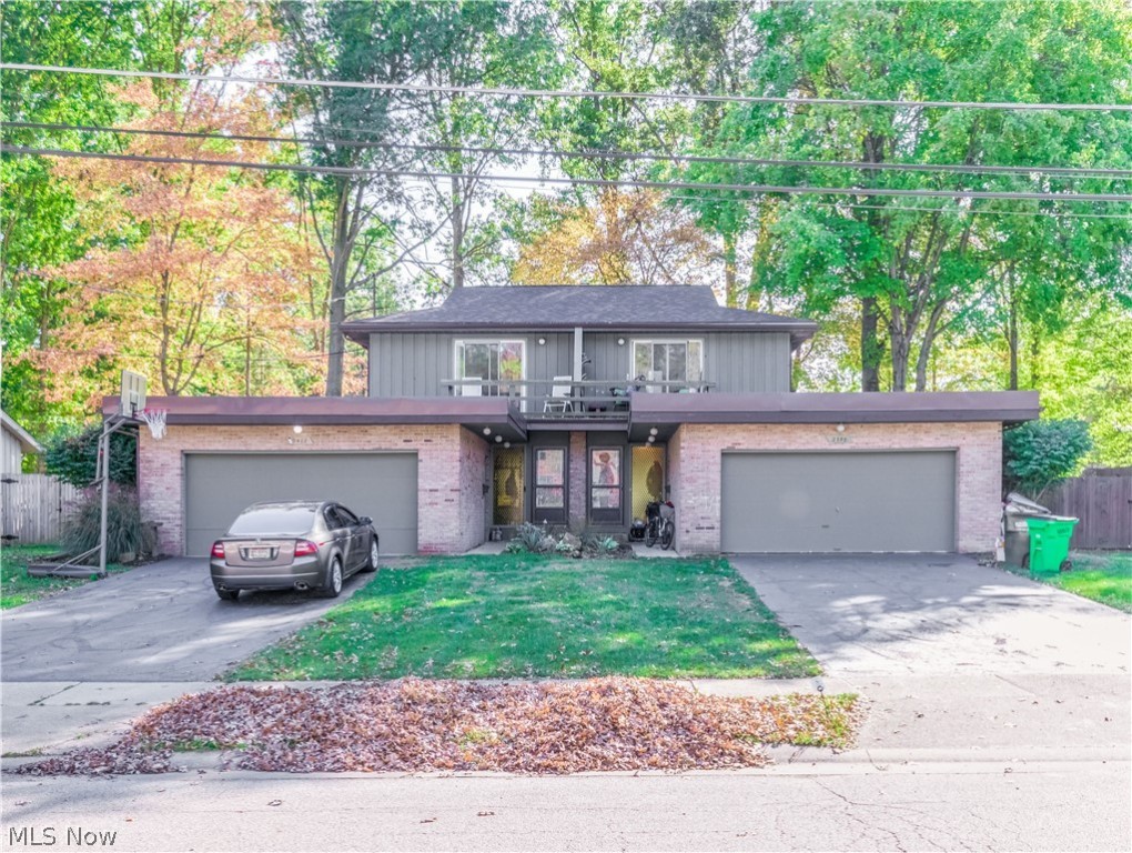 Nice twinplex in desirable Stow neighborhood. Attractive contemporary design, private balconies off the bedroom, spacious bedrooms, kitchen with pass through to the breakfast bar,sliders to patios overlooking large fenced private backyard, each side has 2 bedrooms, 1.5 bath, finished rec rooms  and 2 car attached garages !