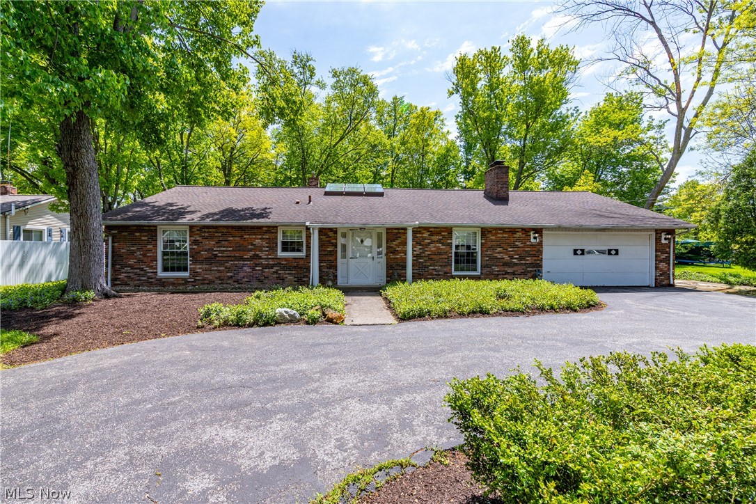 Opportunity awaits in this charming all brick ranch offering the ease and convenience of one floor living in a highly desirable location! Filled with potential and featuring a fantastic layout, this home is ready for your personal touch and vision. Step into the welcoming foyer illuminated by natural light from the skylight overhead. Just off the foyer, the spacious living room features a cozy fireplace, while the formal dining room flows into a large family room complete with a second fireplace and sliding glass doors leading to the outdoor patio space, creating an ideal setup for entertaining and everyday living. The generously sized kitchen offers plenty of space for cooking and gathering. A laundry room leads to a versatile bonus room that would make a great home office, hobby room, or flex space. On the opposite side of the home, you’ll find three bedrooms and two full bathrooms thoughtfully arranged for comfortable living. Situated on a beautiful half-acre lot, this home combines great bones, a functional floor plan, and an unbeatable location. Enjoy being within walking distance to Westlake High School and just minutes from Crocker Park, shopping, dining, and convenient access to I-90. A rare opportunity to create your dream home in the heart of Westlake!