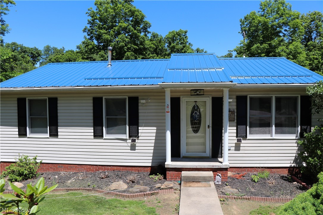 Adorable, move-in-ready ranch loaded with charm! Recent updates include a new metal roof (2025). The thoughtfully designed floor plan provides comfortable, spacious living and an inviting atmosphere throughout. Enjoy the best of both worlds- a quiet location just outside city limits with quick access to shopping, restaurants, and the mall just minutes away!