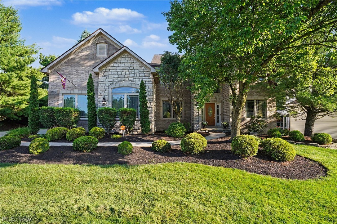 From the moment you step through the front door you will appreciate the pride of ownership and the many updates. Including a three person elevator, new carpeting, updated kitchen featuring granite counter tops and a double copper sink, stainless appliances and an extra large pantry complete the kitchen. From the kitchen you can access the beautiful wrap around stone patio with plenty of room for outdoor entertaining. There is even a locked cabinet to put a television  so you never miss a moment of your favorite sporting events. Easy access to the laundry room and large coat closet from kitchen, with entry to three car garage newly painted and finished with an epoxy floor. New overhead garage doors and freshly painted trim make the garage worry free to store your cars and toys. First floor office includes wet bar and wine racks. Large dining room makes for ease of entertaining all year round. Extra spacious owner suite with huge walk-in closet, sun room with built-in cabinet and on-suite newly remodeled bathroom featuring his and hers sinks, soaker tub and curb less extra large walk-in shower truly make this a feel like a retreat. Three other full size bedrooms and a full size bathroom for plenty of room to grow into or guest rooms make this home ready for it's next Owner. The fully finished basement includes, workshop, full bathroom, storage room and beautiful custom made live edge bar top with custom cabinets, sink and stunning custom made wood tray ceiling make this a a true entertainers dream space. Community amenities include: club house, swimming pool, tennis courts and playground. Home is located within a short walk to Kinsner Elementary school. This home truly has it all, make sure to put on your must 
see list.