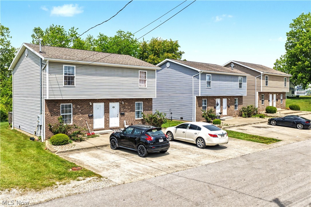 This income-producing 6-unit apartment complex presents a strong investment opportunity with immediate
cash flow and future expansion potential. Built in 2012, the property consists of spacious duplex-style units
featuring 4 bedrooms, 2 full baths, and 2 half baths, offering highly desirable layouts for long-term tenant
retention. The complex is currently operating at 100% occupancy with tenants paying all utilities, helping
maximize investor returns and minimize operating expenses. These well-maintained units provide a stable and
consistent revenue stream with monthly rental flexibility. Included with the property are 3 additional vacant lots,
creating excellent upside potential for future development, additional rental units, or expansion of the existing
portfolio. Conveniently located near schools, parks, shopping, restaurants, grocery stores, and healthcare, this
property offers strong tenant demand in a desirable rental market. An outstanding opportunity for investors
seeking immediate income, low-maintenance construction, and long-term growth potential.