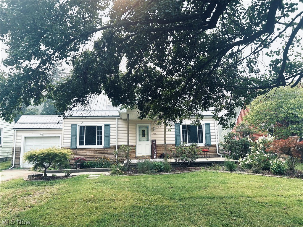 Welcome to this enchanting Cape Cod in a desirable area of Hubbard Township! Step inside to the open space of the combined living room and dining room, perfect for formal meals or relaxing evenings at home. The spacious kitchen offers abundant storage, beautiful cabinetry, breakfast bar and functionality with sliding glass doors that lead to a covered deck. The ideal spot to enjoy your morning coffee or evening beverage. There is a hook up for a stackable washer and dryer in the kitchen area that can be easily converted to a pantry. The main floor features an ample sized bedroom and updated full bath. Upstairs, you’ll find two more generously sized bedrooms connected by a Jack-and-Jill full bathroom, along with walk-in closets and plenty of storage space throughout. New metal roof (2025) New furnace (2024) New well pump (2024) updated tilt-in vinyl insulated windows and newer water heater. The garage features French doors leading out to the back yard, perfect set-up for a party.  No septic replacement is needed, the area is on the upcoming sanitary sewer line project currently slated for 2030. Home does not have central air. Seller has also done some recent additional home repairs, receipts can be provided.