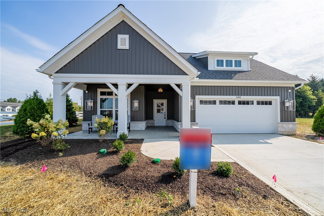 Custom Builder Model Home! This brand-new single-family ranch in Magnolia Meadows combines luxury design, exceptional craftsmanship, and a low-maintenance lifestyle in one of Lorain County’s premier communities. Enjoy a welcoming front porch, open-concept layout, and a fenced, covered courtyard with a custom 2x2 concrete patio—perfect for outdoor dining or relaxing with family and pets.Inside, the designer kitchen impresses with custom soft-close cabinetry, soapstone countertops, GE appliances, and a large center island that opens to the Great Room. Details include a brick accent pantry wall, crown molding, solid core doors, wide trim, and built-ins with shiplap. The Great Room features wall-to-wall glass sliders, flooding the home with natural light and connecting effortlessly to the courtyard.The Primary Suite showcases architectural ceiling detail, a spacious walk-in closet with custom built-ins, and a beautiful bath with dual sinks and an oversized tile shower. Additional highlights include a den with courtyard access, custom ceilings throughout, Energy Star mechanicals, a tankless hot water heater, and high-efficiency furnace and A/C.Residents of Magnolia Meadows enjoy resort-style amenities, including a clubhouse, fitness center, pool, pickleball and bocce courts, and a scenic pond with fountains and a firepit—perfect for gathering with neighbors and friends. The HOA ($295/month) covers lawn care, landscape beds, snow removal, and front walkway shoveling for truly carefree living.Ideally located near Avon, Avon Lake, Bay Village, Westlake, and Rocky River, this home offers convenient access to fine dining, golf, shopping, and Lake Erie recreation. Experience upscale, maintenance-free living in a thoughtfully designed community.