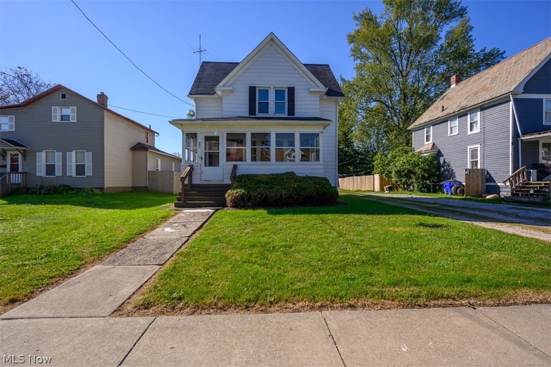 Charming & Cozy this 2 bedroom home is a must see!  Beautiful original woodwork, fresh paint and newer carpet throughout! Enclosed front porch and 3 car detached garage with 220 AMP electric and gas are an extra bonus! Seller providing a one year home warranty! Schedule your viewing today! Home is being sold as is.
