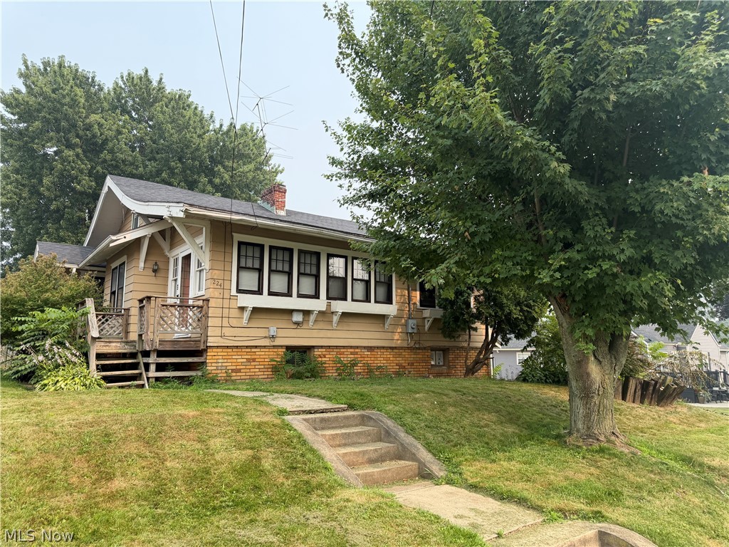 Charming bungalow in Perry Township awaiting your all of your personal touches. The home has a large fenced in backyard with an oversized two car garage that walks into the basement with a cozy living area and space for laundry, recreation, and a half bathroom. The main floor features not only 3 bedrooms and 2 full bathrooms but also a bay window, overlooking the dining space and kitchen with updated cabinets and backsplash. The living room space glows with natural light and provides ample space for the whole family. All with a flexible 4th bedroom space upstairs! Solid bones, a functional layout, and great square footage is hard to come by at such a great price!