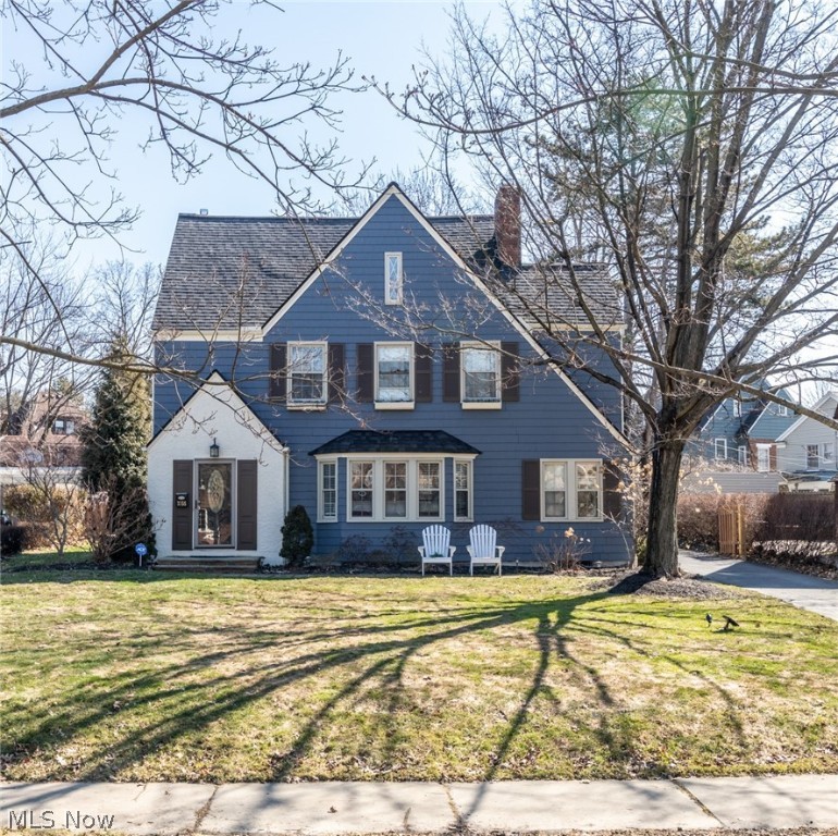 his beautiful Shaker Heights colonial is situated on an enormous, oversized lot in the heart of the highly desired Fernway Neighborhood,  a close-knit, family driven community. Move-in ready and bursting with charming details, this home features beautifully finished hardwood floors, an updated kitchen with eating area, 4 spacious bedrooms, 3.5 bathrooms, and central air conditioning. The main floor includes a half bathroom, a dining room, a spacious and bright living room with a bonus room that could easily be used as a playroom, office, or exercise room. The kitchen, featuring granite countertops, a serving/eating counter, and stainless appliances,  opens up to a family room with large windows that overlook the back yard. Perfect for watching the children play from the kitchen! The second floor features 3 spacious bedrooms with well maintained hardwood floors and two full bathrooms. The third floor boasts a large bedroom, full bath, and exceptional storage space. Outside you’ll find a