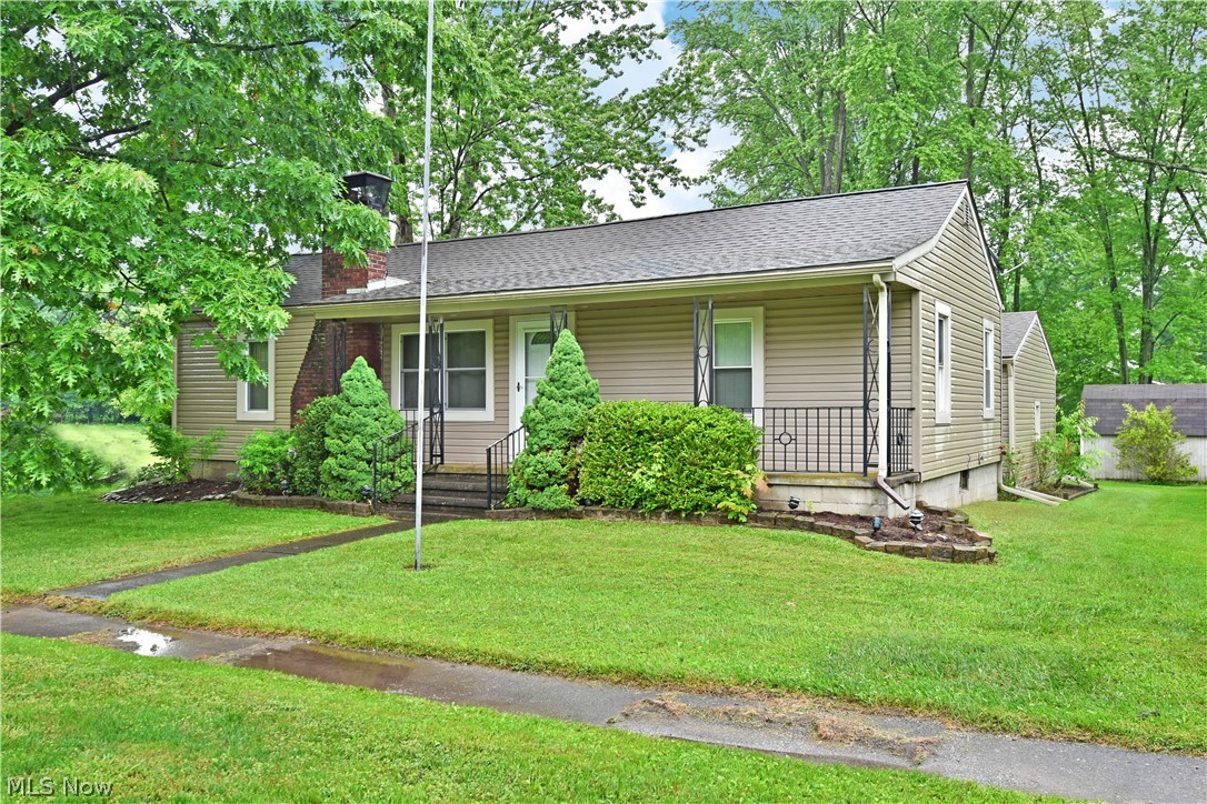 Cozy 2 bedroom home on corner lot with 2 car garage.  Updated siding, windows, kitchen and bathroom. Hot water tank 5 years old. Roof 10 years old. 2 parcels.  Don’t miss out on this home! Call for your showing today!