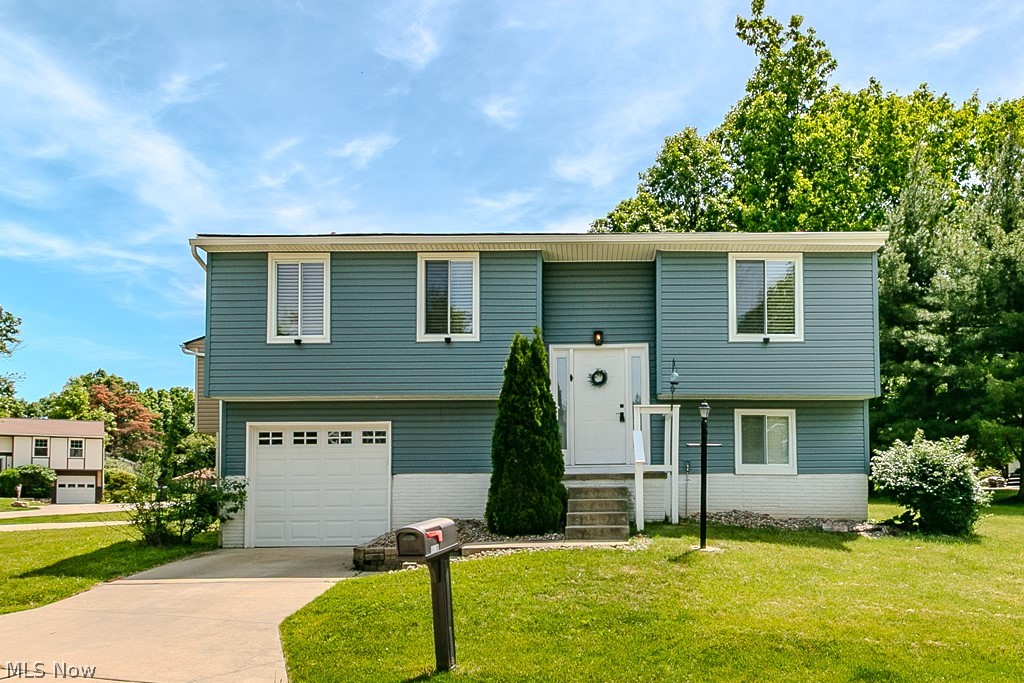 Step inside this well-maintained and updated inside and out condo. Enjoy a layout that offers comfort, flexibility, and room to spread out. The main living area feels bright and inviting, flowing naturally from the living room into the dining space, creating an easy setting for everyday living or casual entertaining. Just off the dining area, the kitchen offers convenient access and a functional layout, keeping everything within reach. Three bedrooms are tucked on the main level, offering comfortable spaces for rest, guests, or a home office, along with a full bath nearby.

The finished lower level adds even more living space with a spacious family room that feels cozy and versatile, perfect for movie nights, hobbies, entertaining, or simply relaxing. A second full bathroom, lower-level laundry area, and additional storage space add everyday convenience. Recent updates including the roof, siding, A/C, and garage door provide added peace of mind. Enjoy all that Aurora Shores has to offer, including lake access, fishing, pool, playground, park, and recreation areas, all within the Twinsburg City School District.