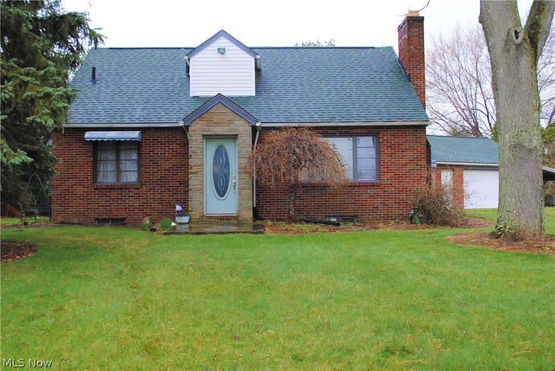Welcome home to this beautiful Cape Cod located in North Canton Ohio within Jackson Local School District.  Situated on a large lot of 1.4 acres of land.  Walk in the back door, through the mud room, into a large eat in kitchen. Kitchen has a cook top and a built in double wall oven, plenty of cabinet space, counter space, great for entertaining family and friends.  Not to mention a trash chute that goes into the basement  Go into the living room and the fireplace is gas or wood, with an ash cleanout that goes into the basement, and blower fans to quickly heat the room.  Master bedroom on the main floor next to the half bathroom.  The additional living area could make a wonderful home office or add a closet to make it an additional bedroom.  Upstairs you will find two bedrooms and the full bathroom.  This bathroom has an oversized tub.  One of a kind natural hardwood throughout the home, sourced from the property when it was originally constructed.  Laundry room was added in the baseme